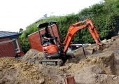 Moving storm water & sewer pipes to enable installation of in-ground pool