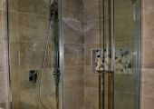 Bathroom renovations - Shower with tiled base complete with Designer sliding door shower screen.