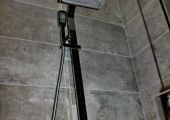 Designer shower head with hand held piece