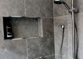 Shower care rail with niche' & grab rail
